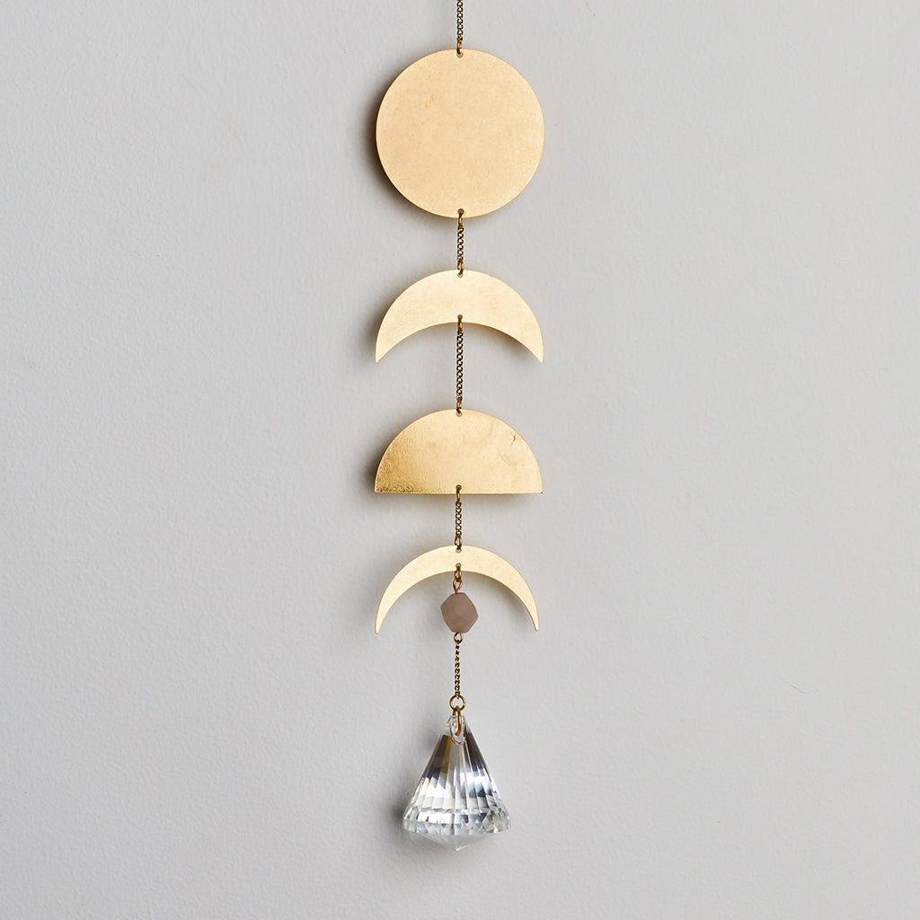 Scout moon phase suncatcher with gold brass lunar shapes and hanging crystal prism