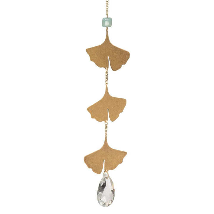 Scout suncatcher with three gold ginkgo leaves, green stone accent, and crystal drop