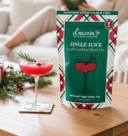 D'Marie Jingle Juice Craft Cocktail Slush Mix in green festive holiday packaging with prepared drink