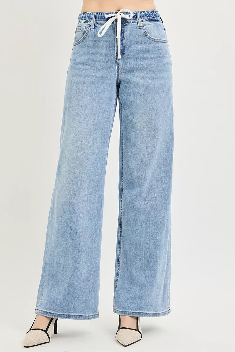 Light blue wide leg denim jeans with drawstring waist and relaxed fit
