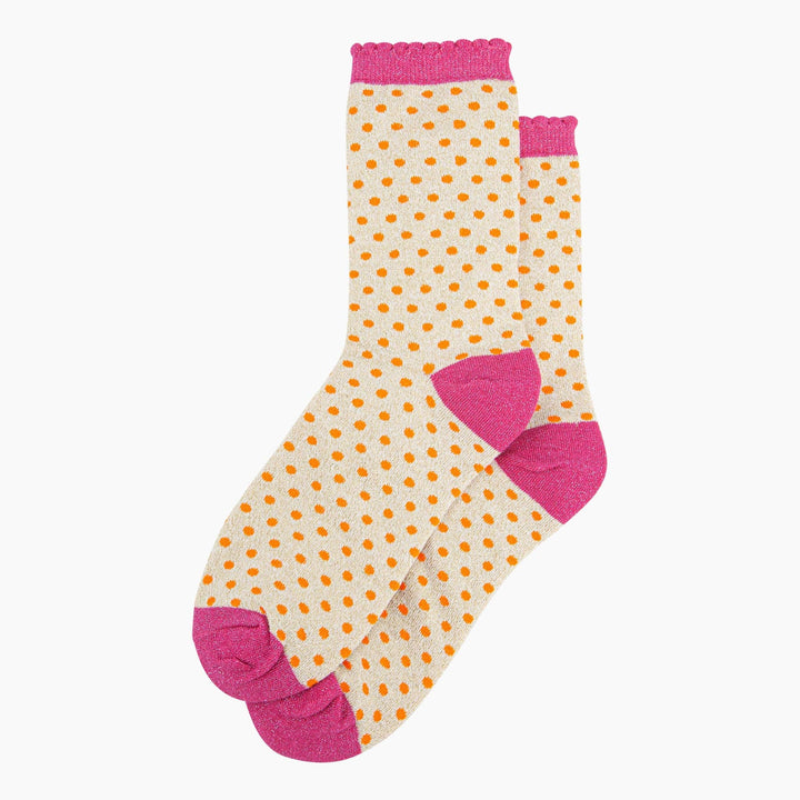 Cream glitter ankle socks with orange polka dots and pink heel, toe, and cuff