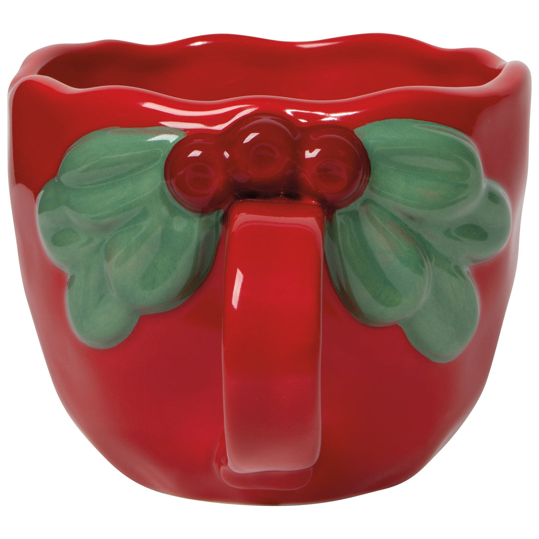Red ceramic Christmas mug with sculpted green holly leaves and red berries handle