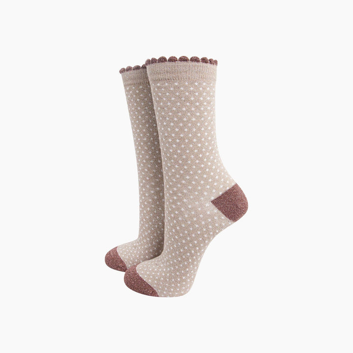 Beige polka dot crew socks with mauve glitter scalloped cuff and contrast heel toe