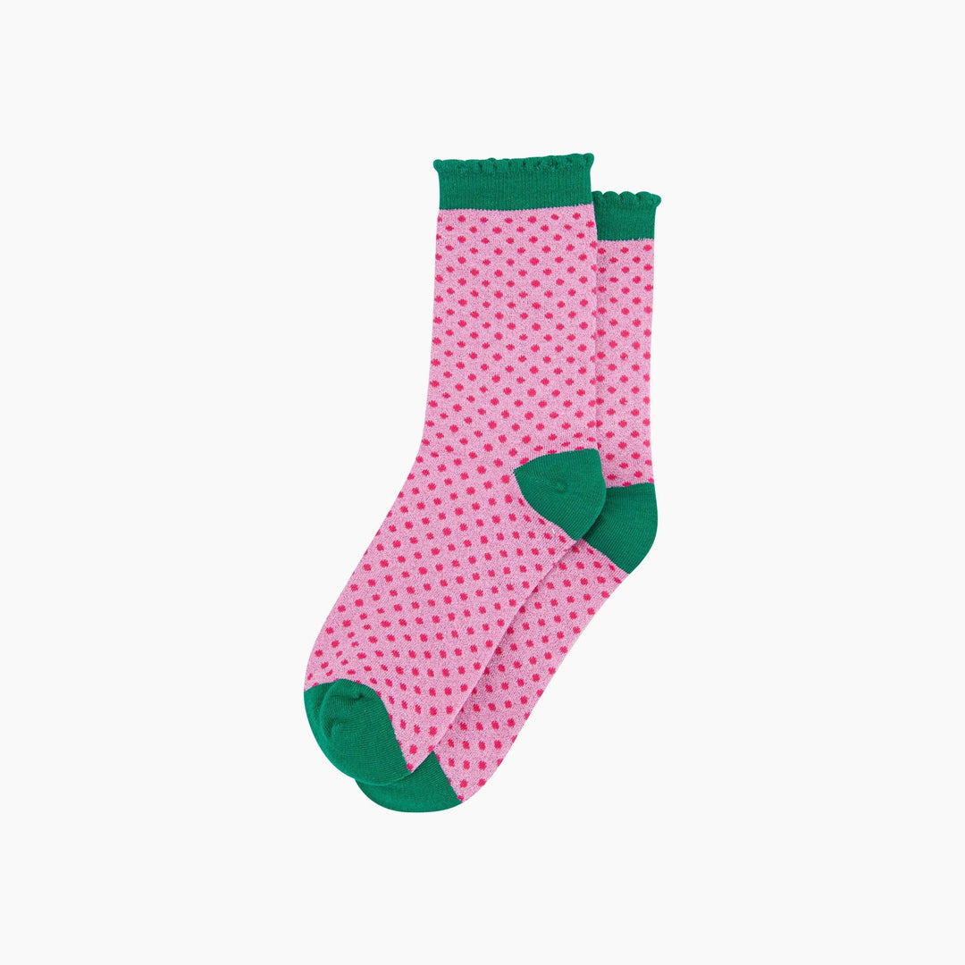 Pink glitter ankle socks with hot pink polka dots and green heel, toe, and frill cuff