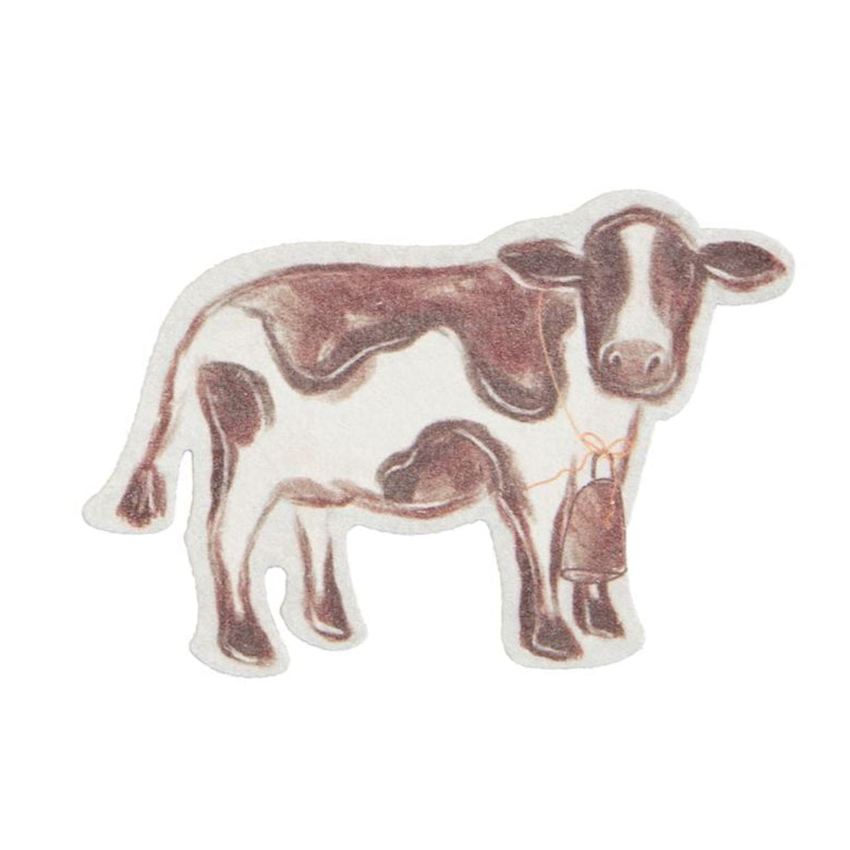 Brown and white spotted cow-shaped pop up sponge on white background