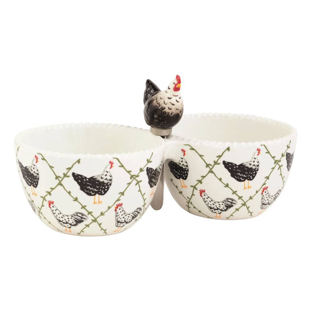 White ceramic double bowl with black and white rooster pattern and decorative chicken lid