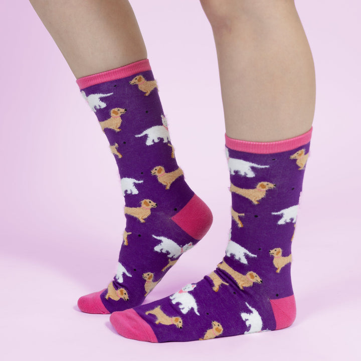 Purple unisex socks featuring small dog pattern with pink toe and heel accents