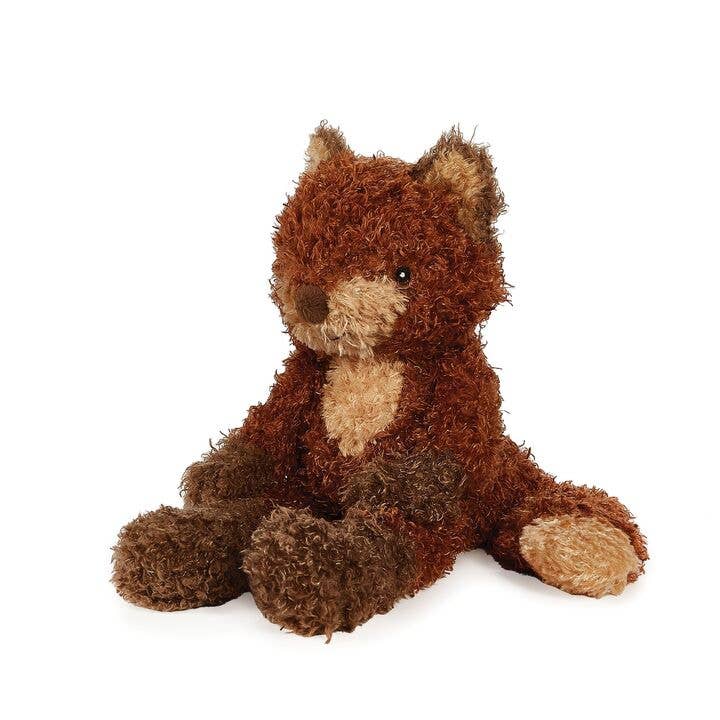 Brown and cream plush fox stuffed animal with fluffy textured fur sitting upright