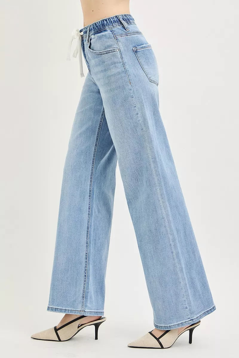 Light blue slouchy wide leg jeans with drawstring waist and pockets