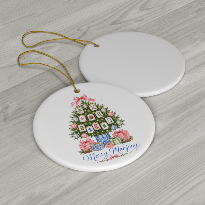 Round white ceramic ornament featuring a mahjong tile Christmas tree with &