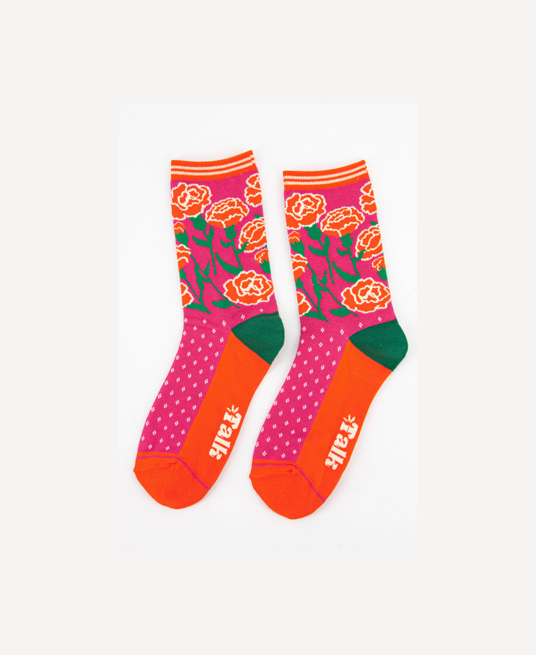 Pink and orange bamboo crew socks with carnation floral pattern and green heel