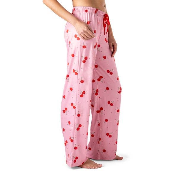 Pink pajama pants with red cherry print pattern and elastic waistband