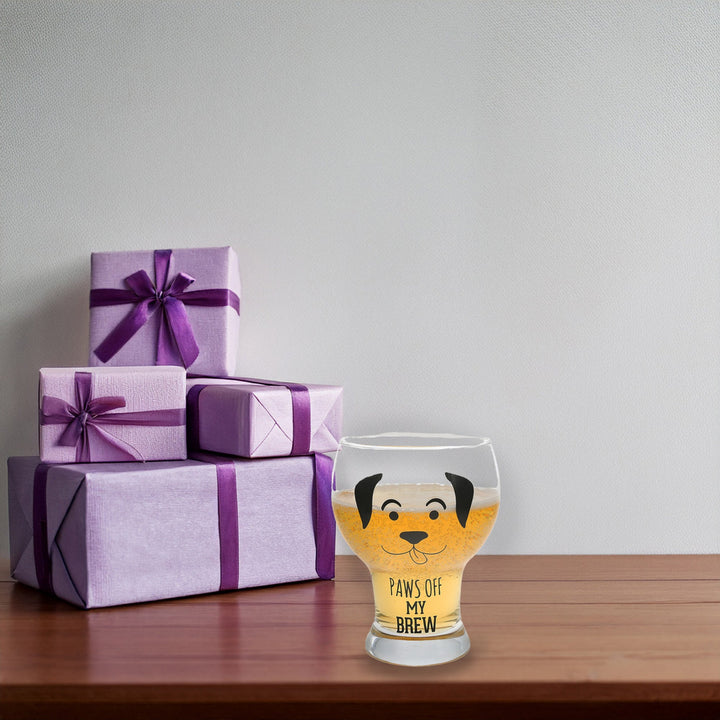 Clear pilsner glass with cute dog face design and 'Paws Off My Brew' text