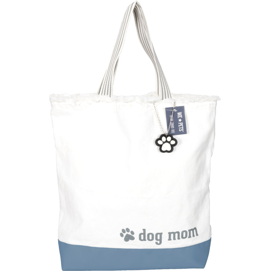 White and blue canvas tote bag with dog mom text and paw print charm