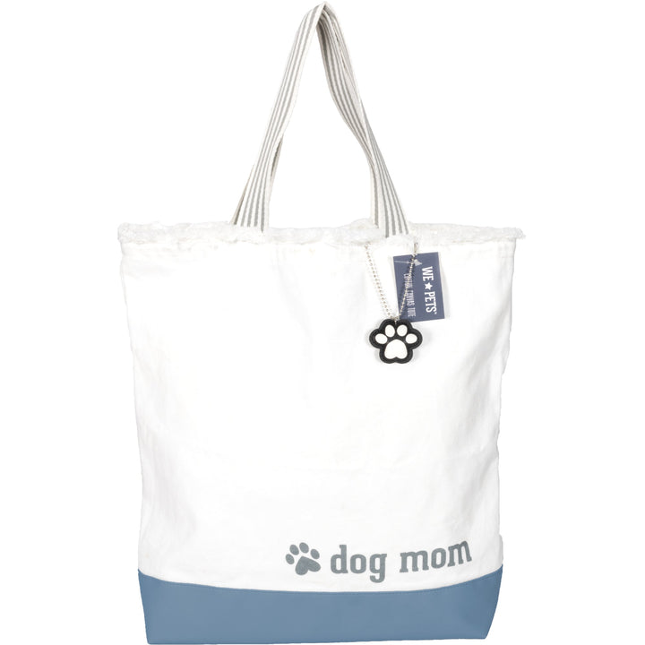 White and blue canvas tote bag with dog mom text and paw print charm