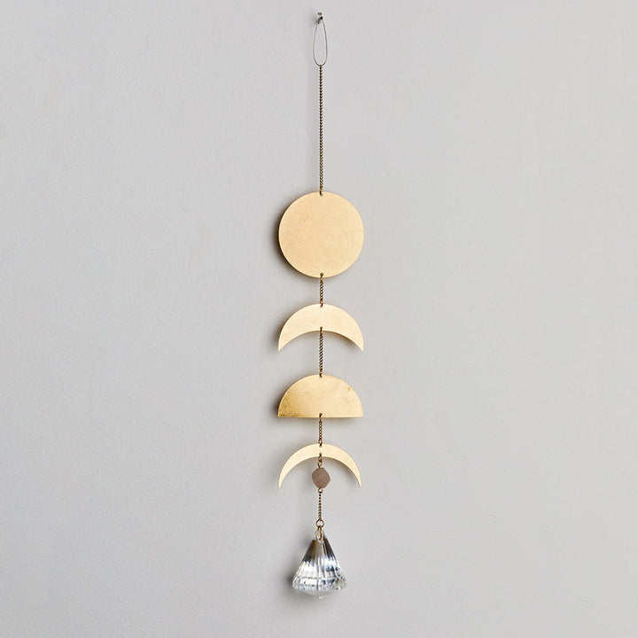 Gold moon phase suncatcher with full moon, crescent, and half moon shapes plus crystal prism