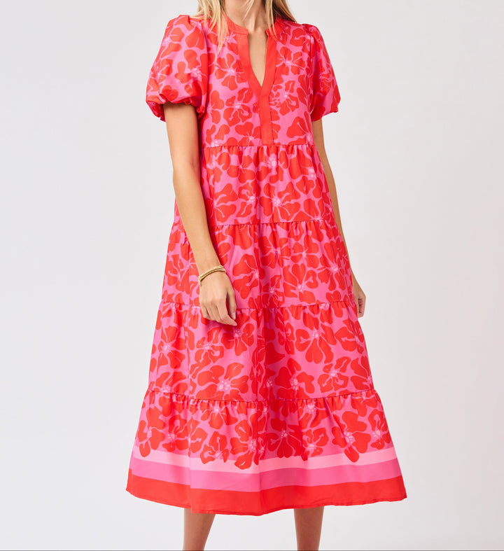 Pink floral tiered midi dress with puff sleeves and V-neck