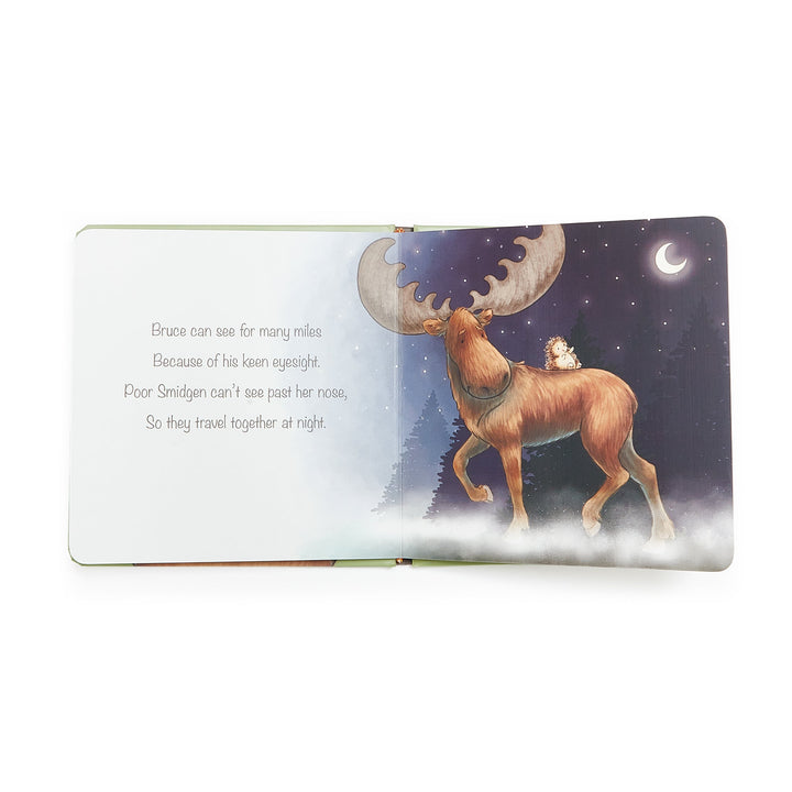Open board book showing moose Bruce and hedgehog Smidgen traveling together at night