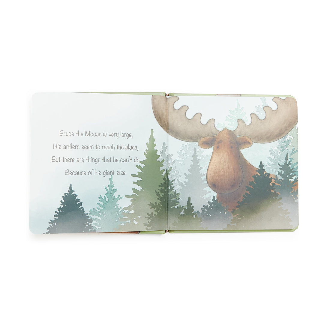 Open board book showing Bruce the Moose illustration with pine trees and rhyming text
