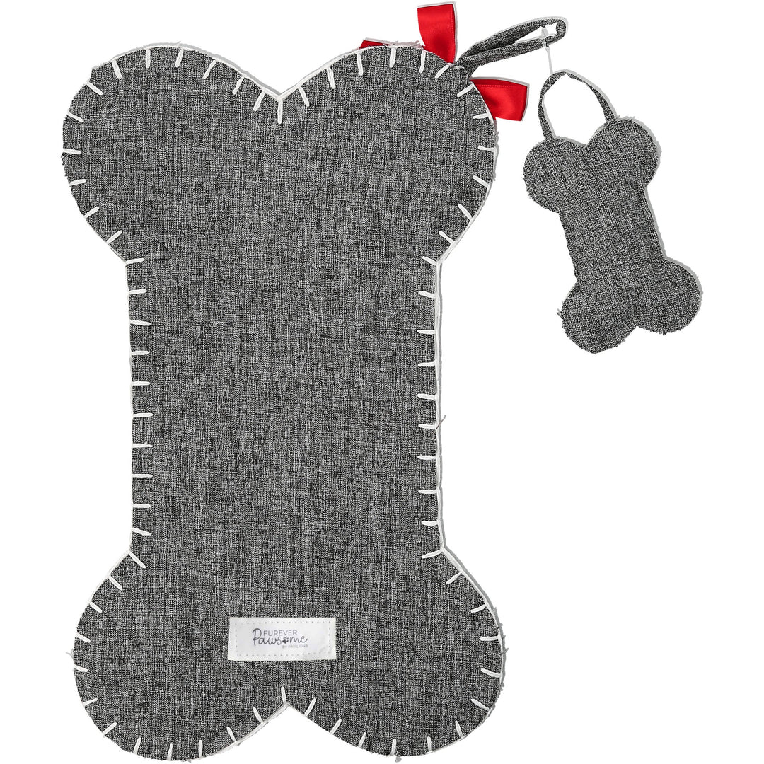 Gray canvas tweed Christmas stocking with bone-shaped toy, decorative stitching and red ribbon