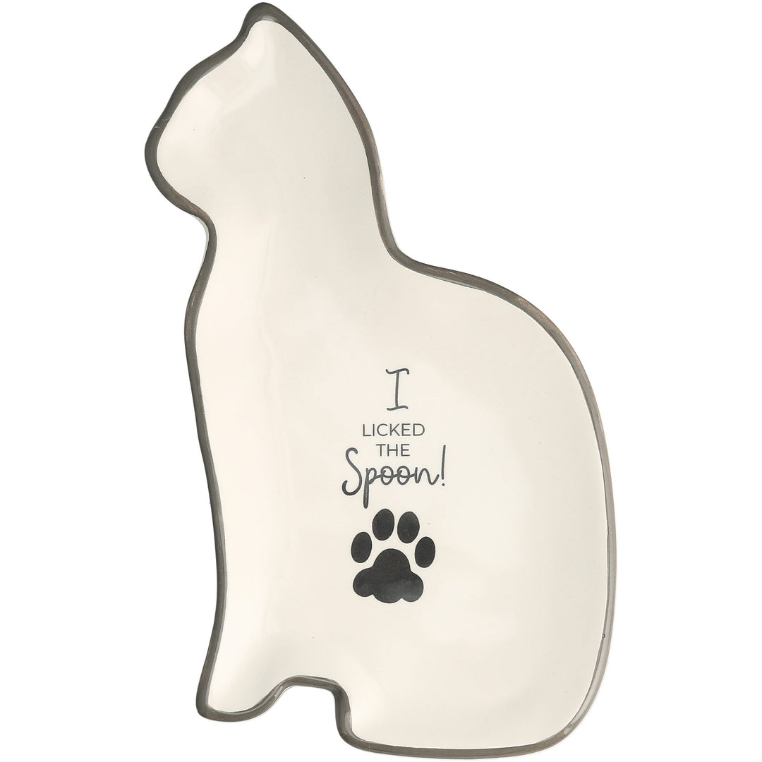 Cat-shaped cream colored spoon rest with paw print and 'I Licked the Spoon' text