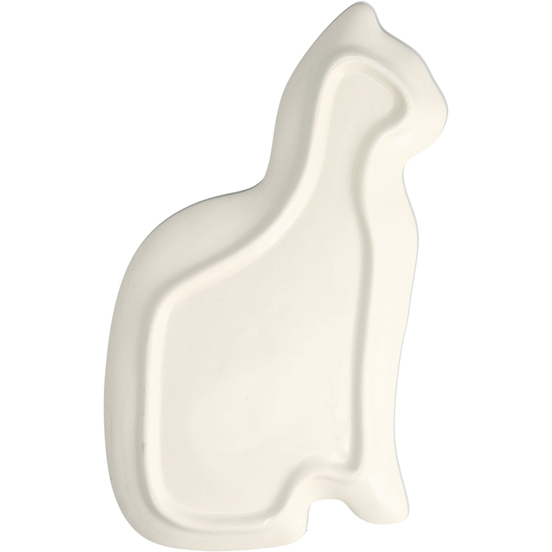 Cream colored cat-shaped ceramic spoon rest with curved design and raised edges