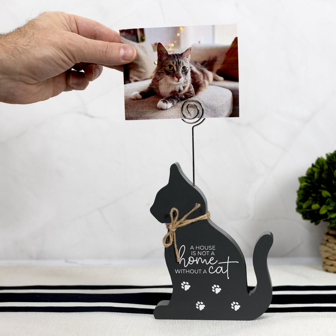 Dark gray cat-shaped photo clip holder with inspirational text and paw prints