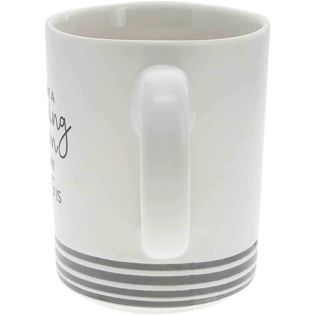 White ceramic mug with gray striped base and dog silhouette design by Pavilion