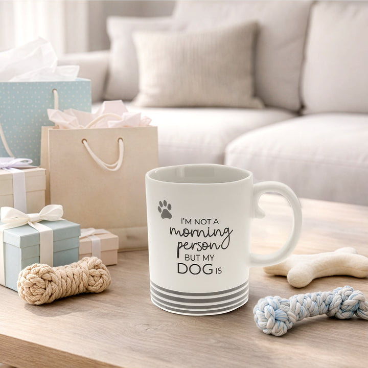 White 15 oz ceramic mug with dog paw print and text about morning person
