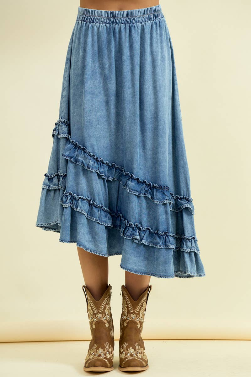 Light blue denim asymmetrical ruffle midi skirt with cowboy boots