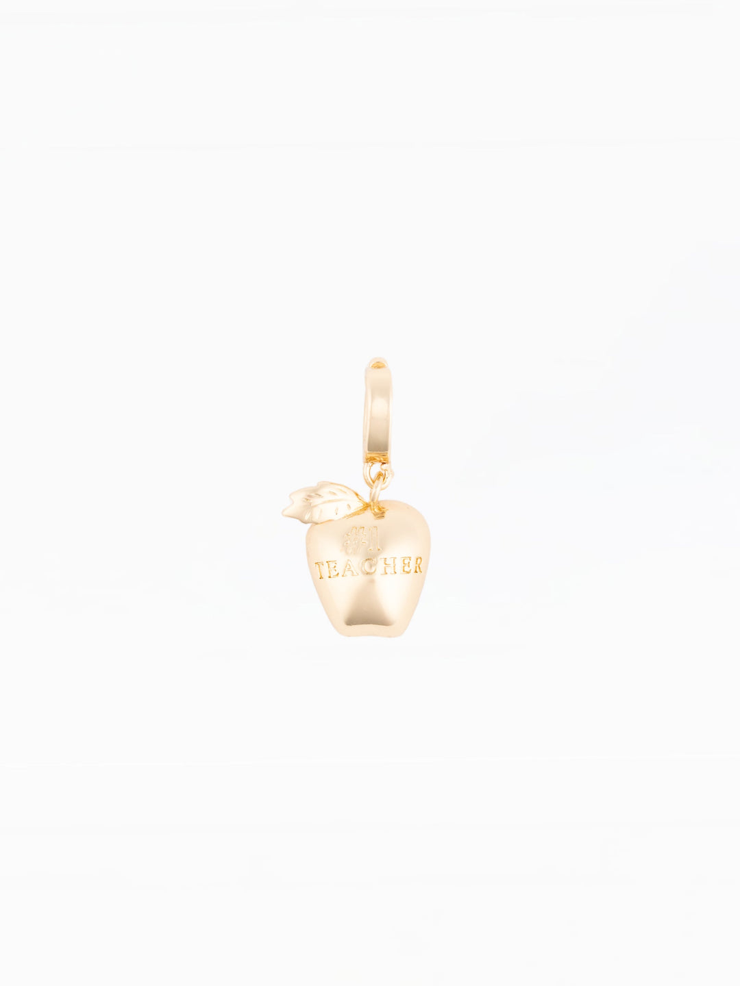 Michelle McDowell gold apple charm engraved with Number One Teacher on white background