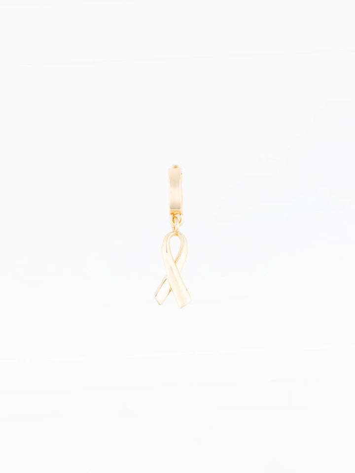 Gold awareness ribbon charm pendant on small huggie hoop earring by Michelle McDowell