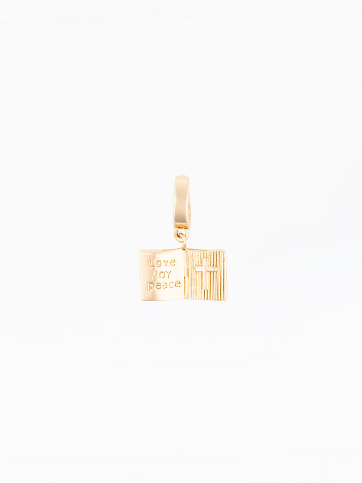 Michelle McDowell Sophie gold Bible charm with Love Joy Peace engraving and cross detail