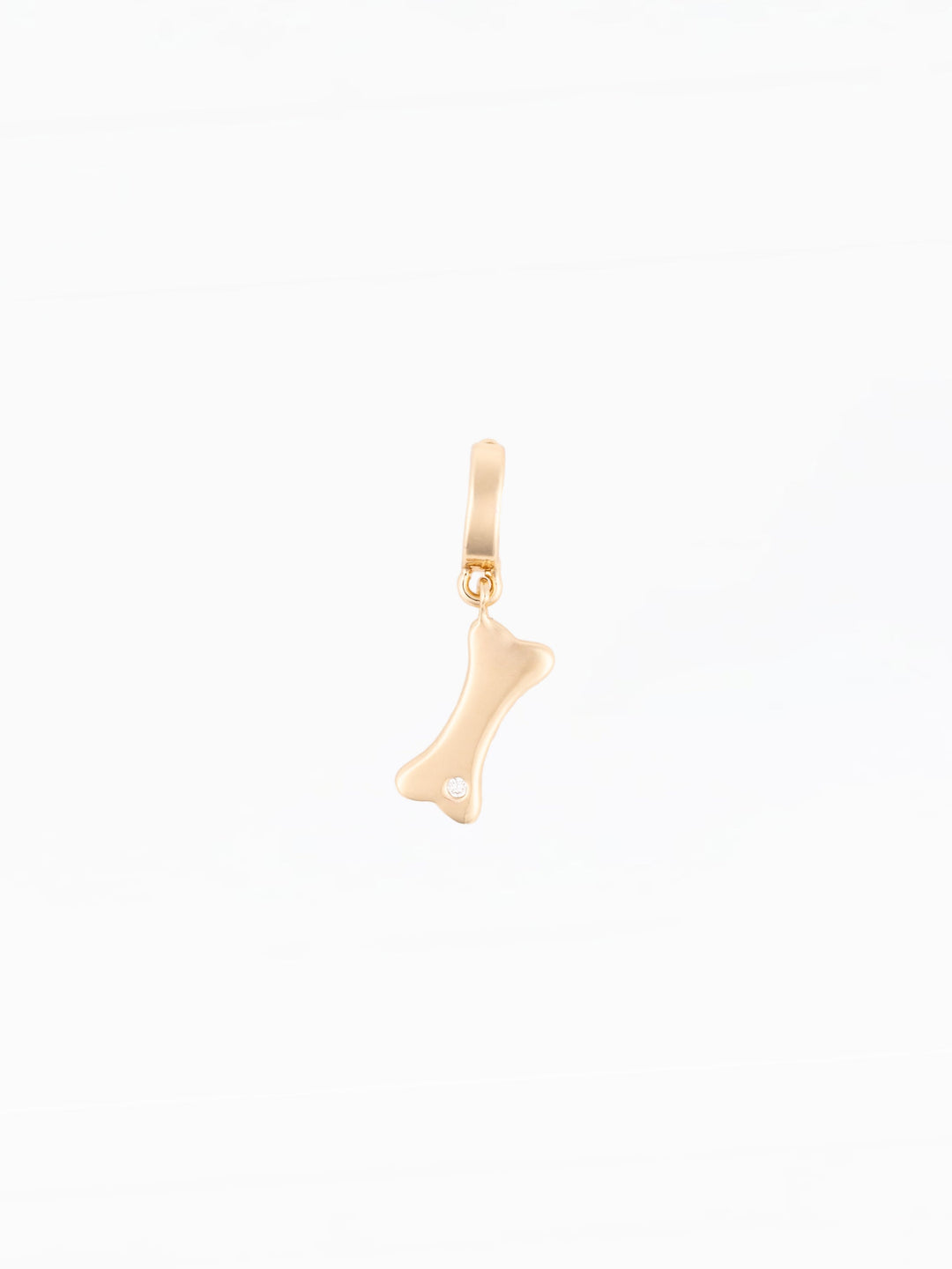 Michelle McDowell Charm Sophie gold dog bone pendant charm with diamond accent on clasp
