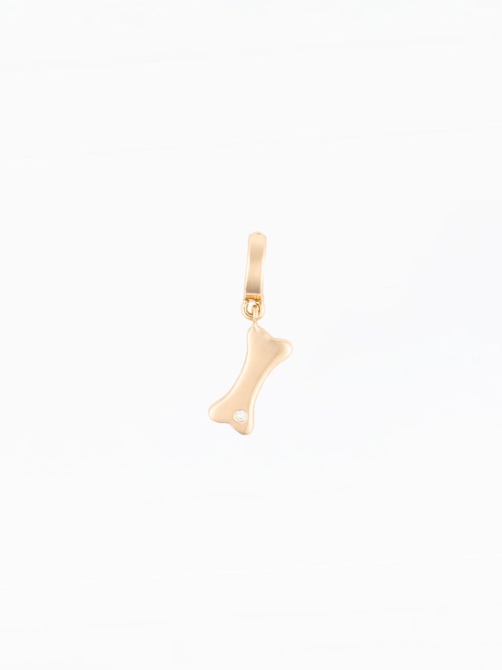 Michelle McDowell Charm Sophie gold dog bone pendant charm with diamond accent on clasp