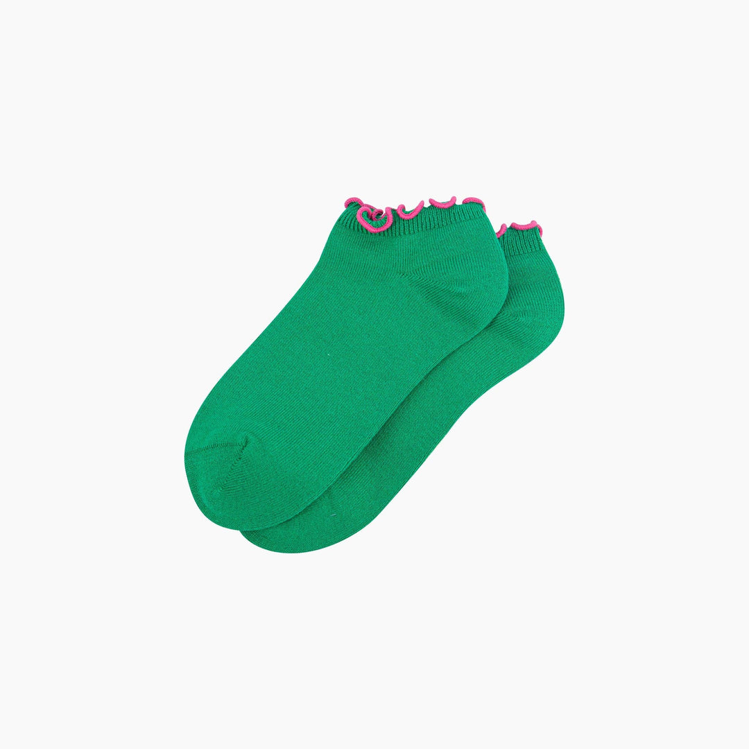 Green bamboo ankle socks with pink frilly ruffle trim, pair shown flat