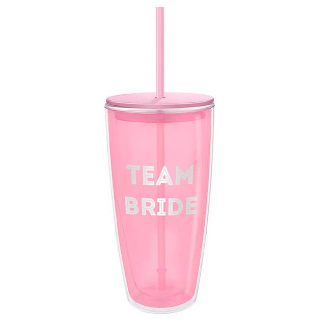 Pink 22oz travel tumbler with straw featuring 'TEAM BRIDE' text in white letters