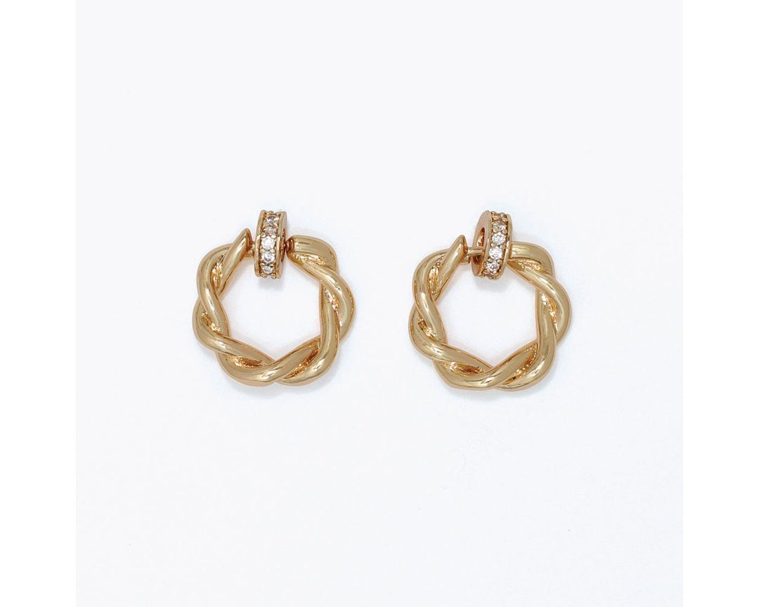 Gold twisted hoop drop earrings with crystal CZ pavé connector detail