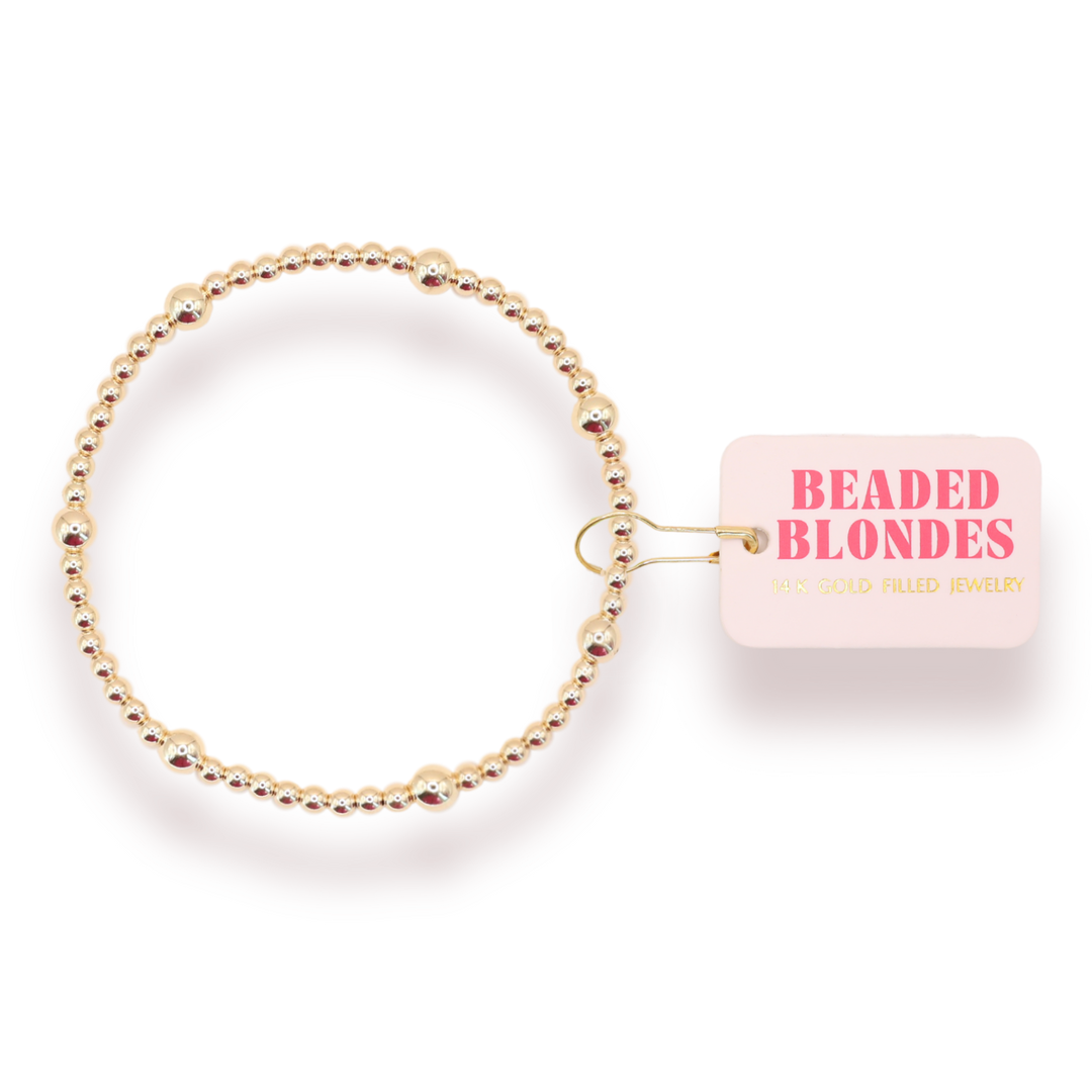 Beaded Blondes Olive Bracelet in 14K gold filled beads on display card