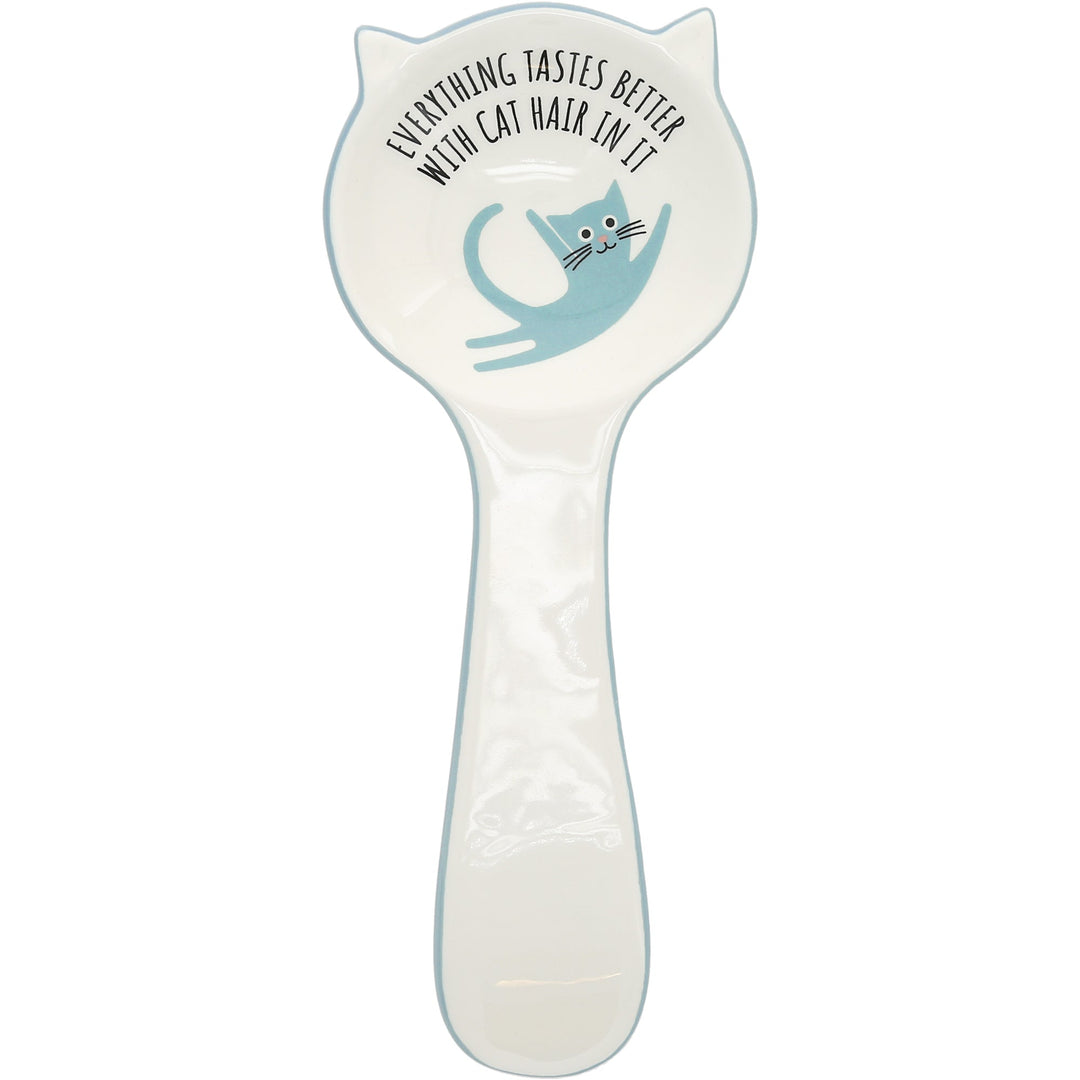Cat-shaped spoon rest with blue cat silhouette and humorous text about cat hair