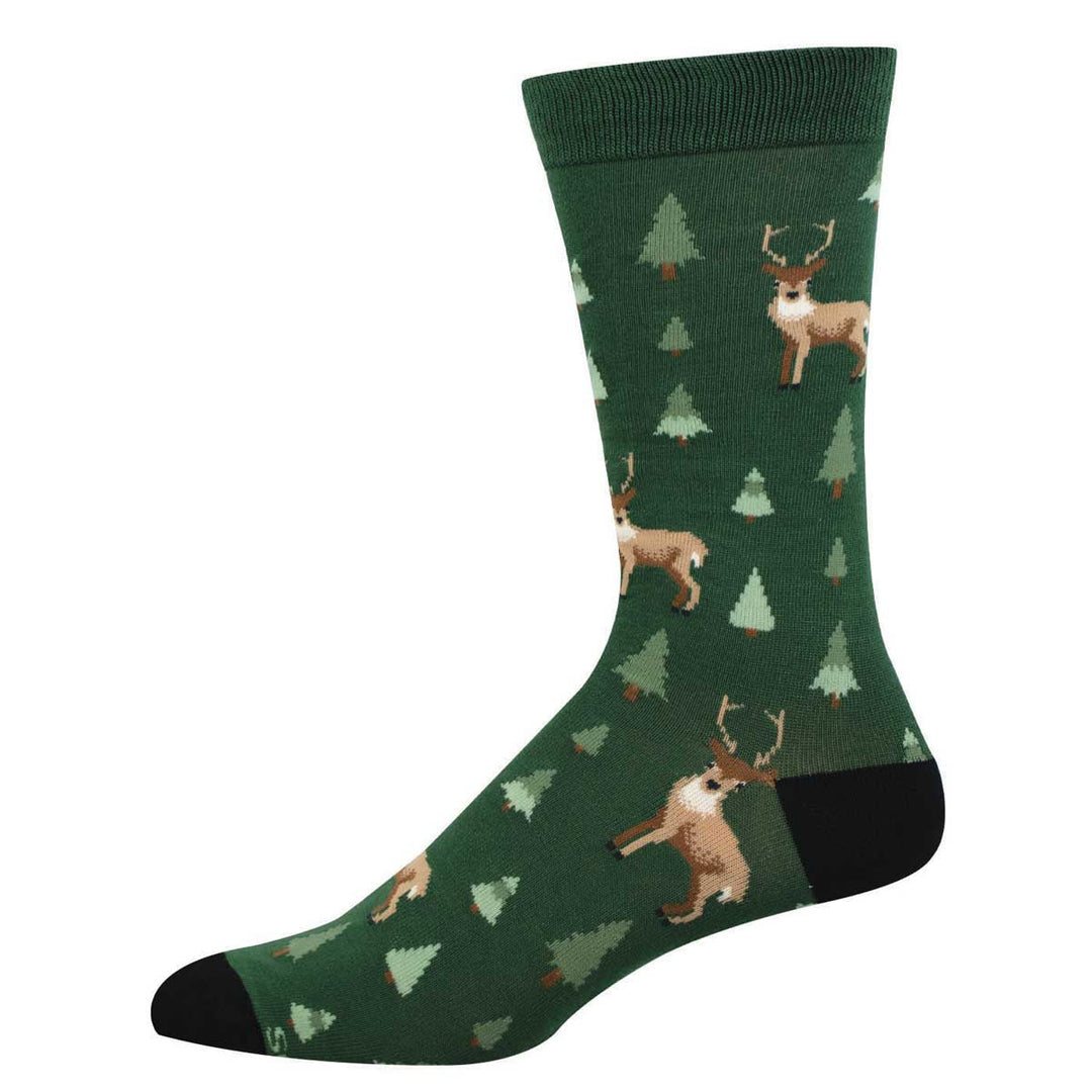 Socksmith green crew socks featuring deer and pine trees pattern with black toe and heel