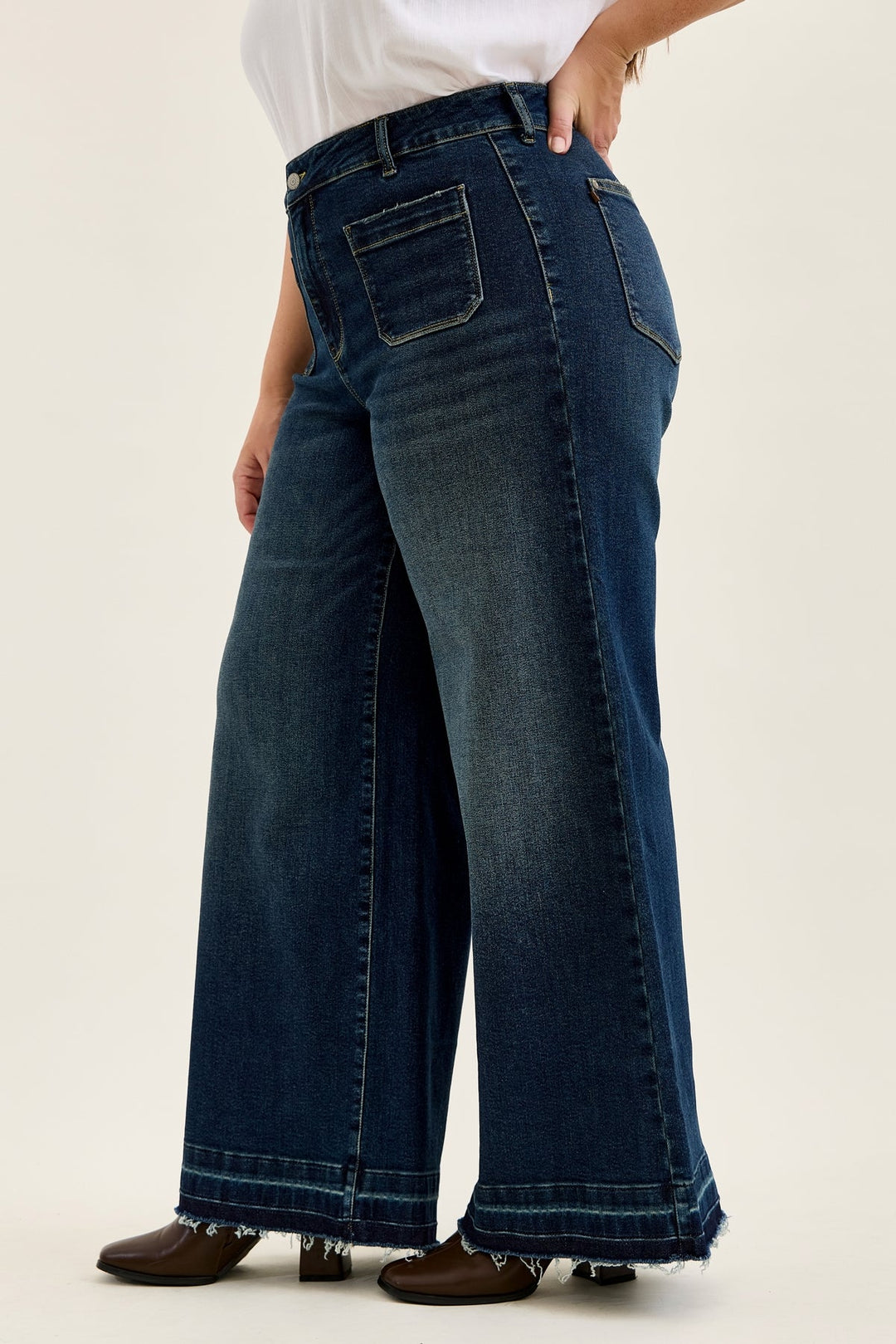 Judy Blue high-waist Liza palazzo jeans in medium wash with front patch pockets and frayed hem