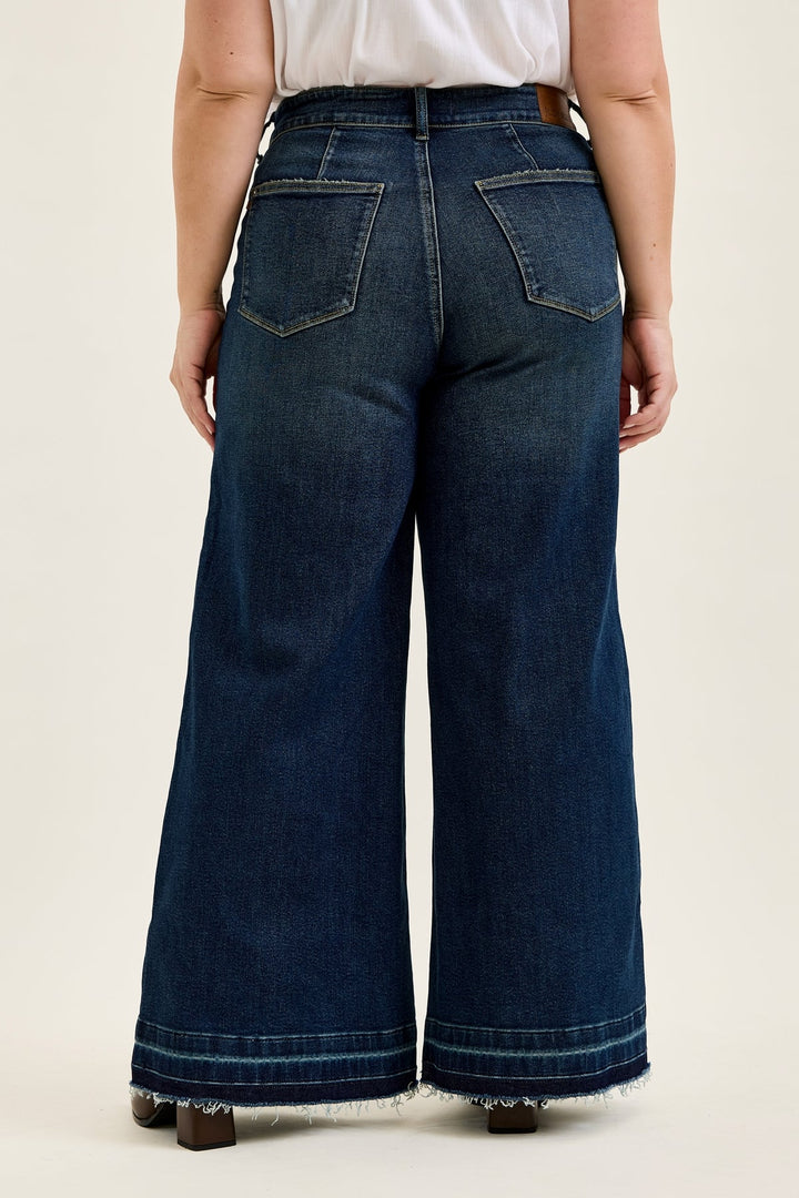 Judy Blue HW LIZA Palazzo jeans in medium wash with wide legs and frayed hem, back view