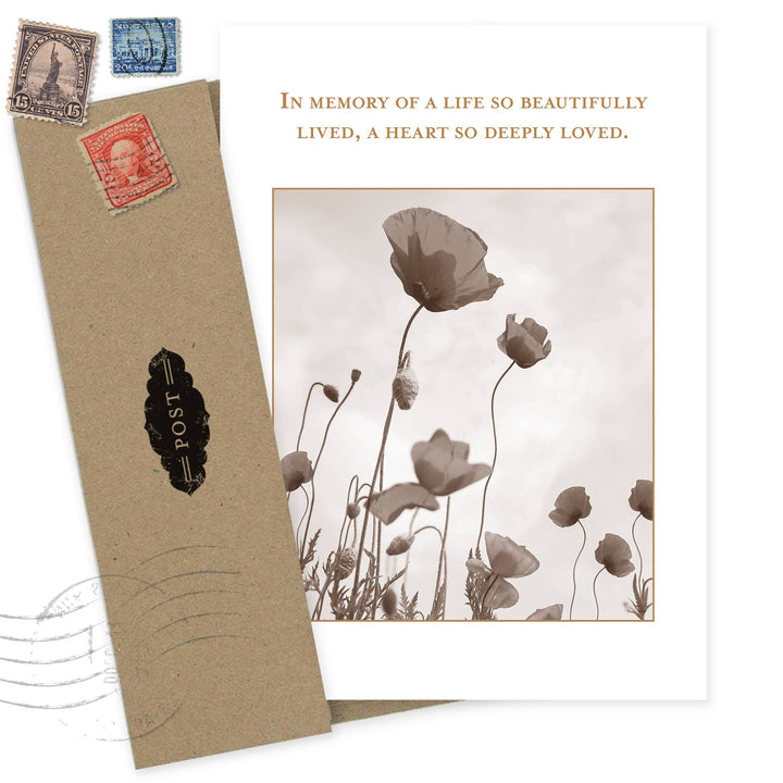 Memorial sympathy card with vintage poppies and text 'In memory of a life so beautifully lived'