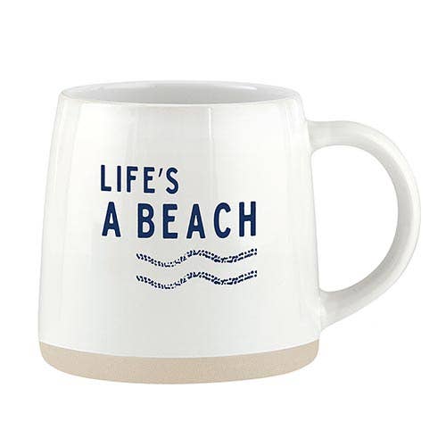 White ceramic mug with beige rim featuring 'Life's A Beach' text and wave design