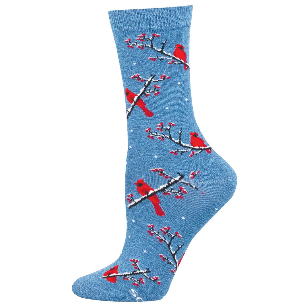 Blue heather crew socks featuring red cardinal birds perched on snowy branches with berries