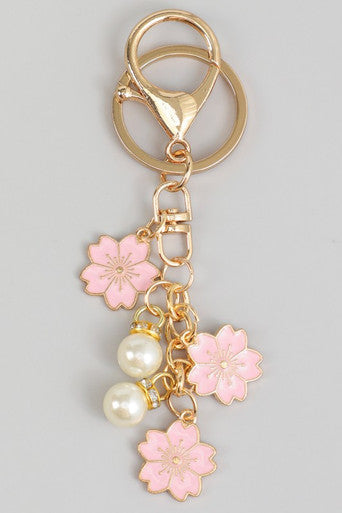 Gold keychain bag charm with pink cherry blossom flowers and pearl beads