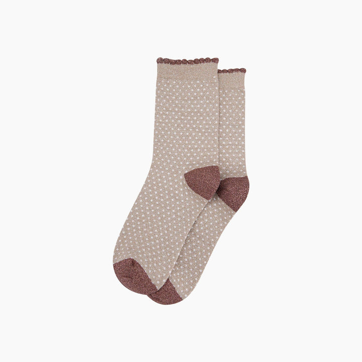 Beige glitter ankle socks with white polka dots and mauve scalloped cuffs and heel toe
