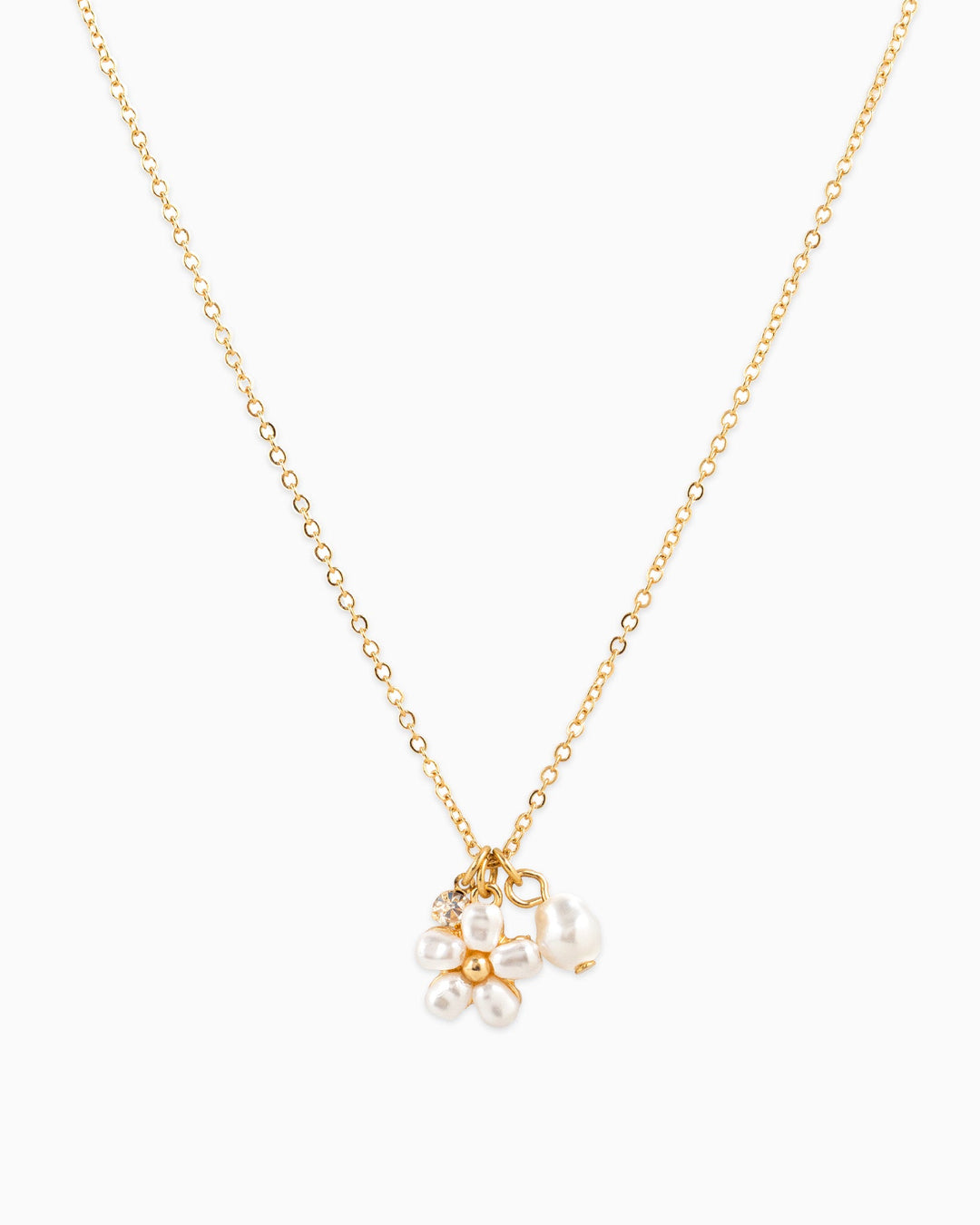Dainty gold chain necklace with pearl flower charm, loose pearl, and crystal stone pendant