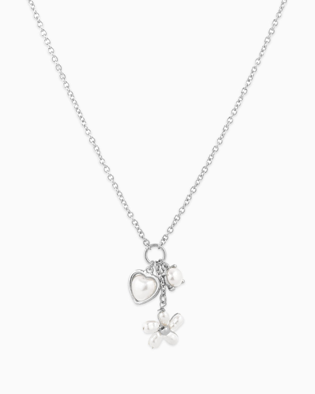 Silver Y-drop charm necklace featuring pearl heart, pearl bead, and pearl flower pendants
